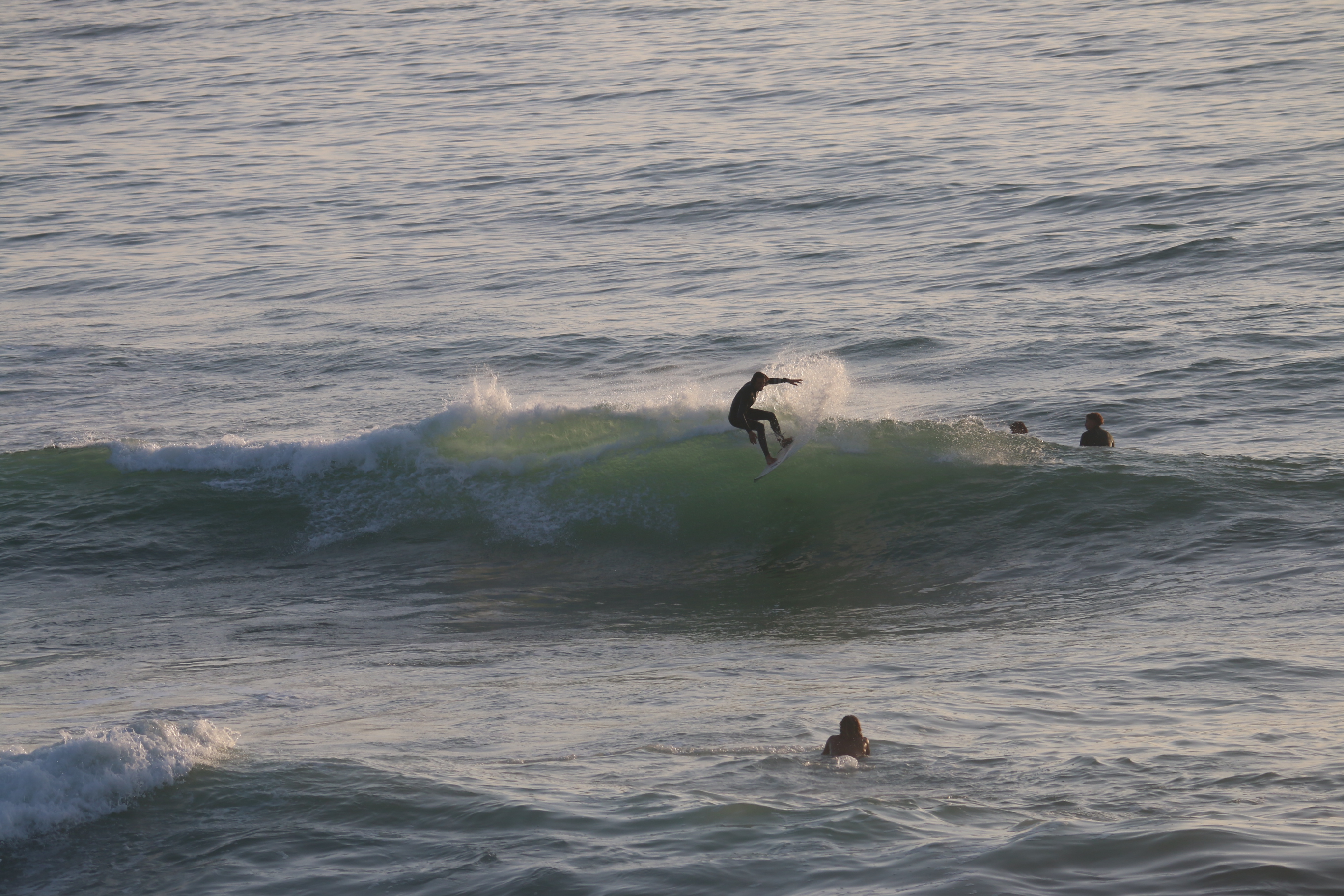Intermediate surfer with a board